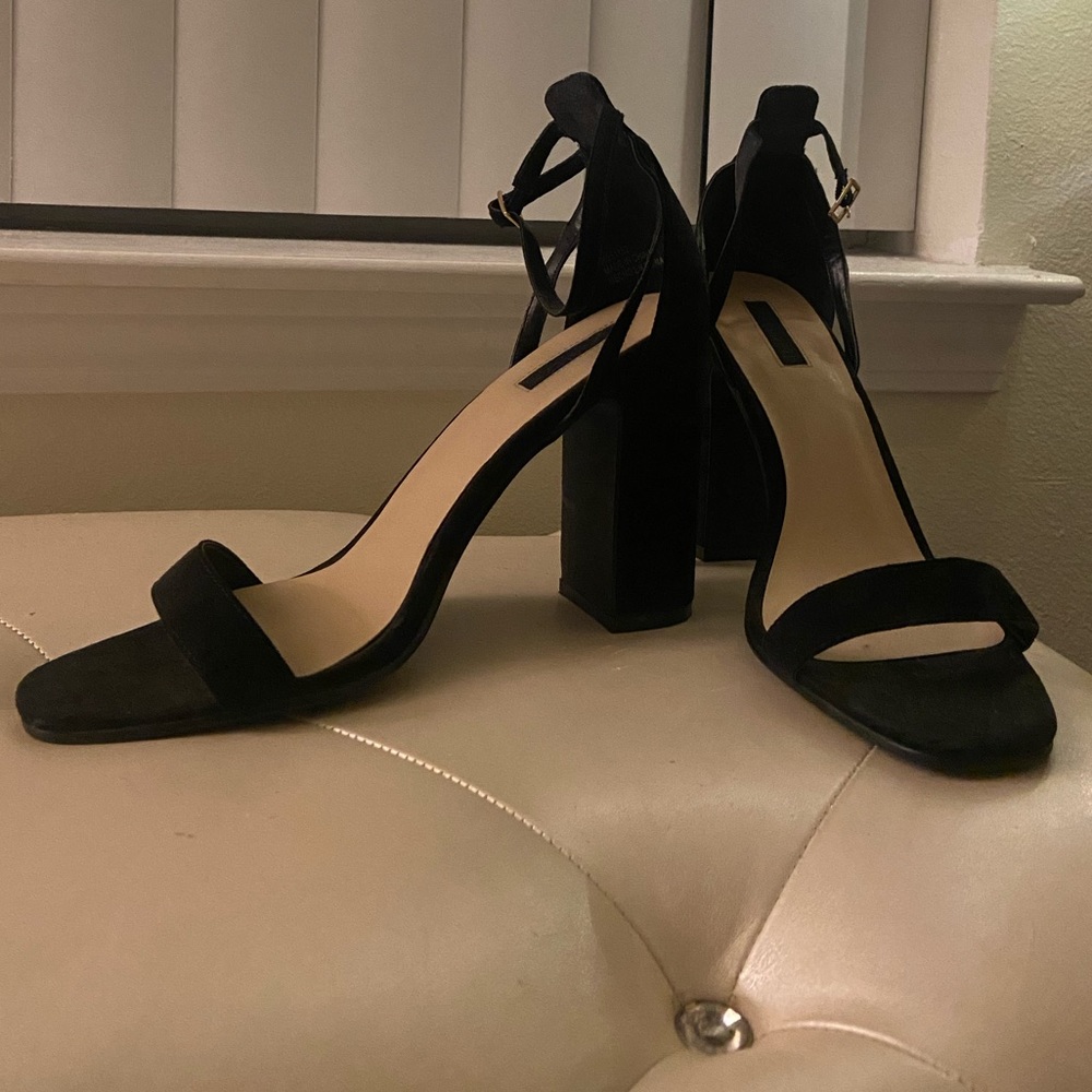 Black strapped heels. Size 10
